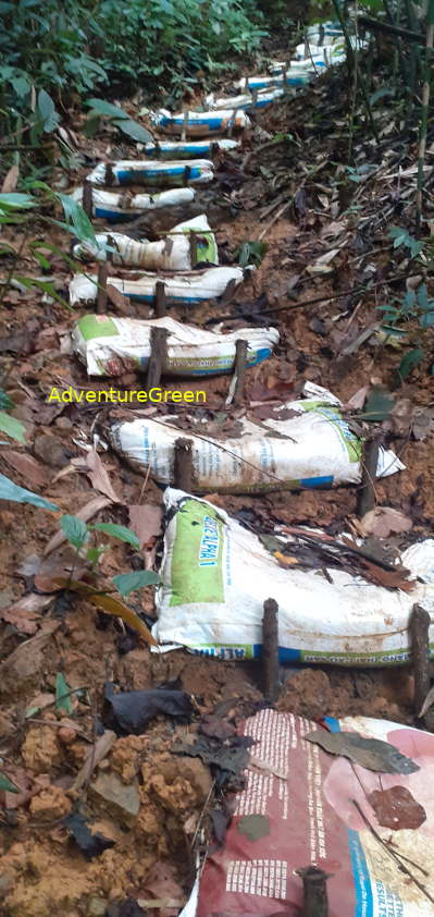 A steep hiking path paved with sandbags on the Pu Luong Mountain